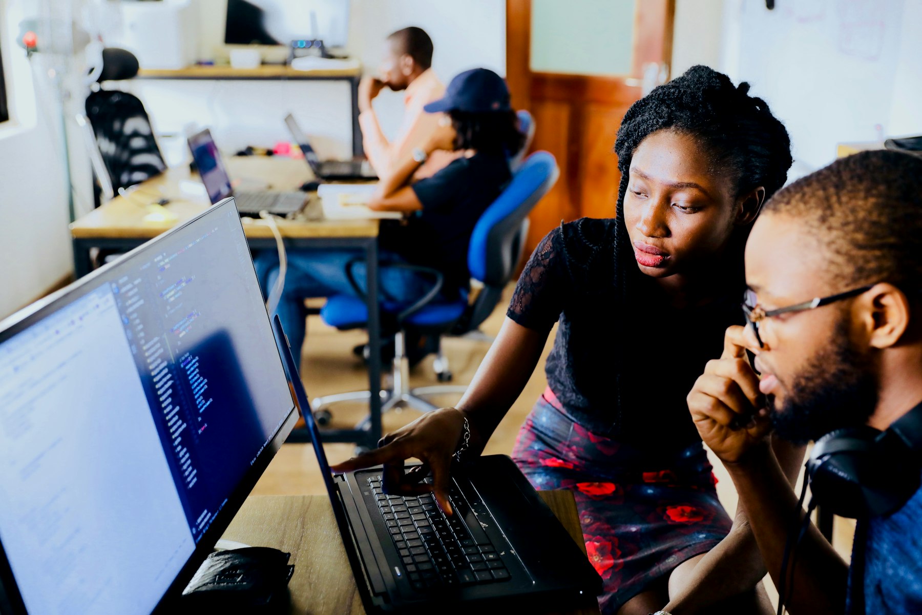 Team collaborating around a table in a bright office