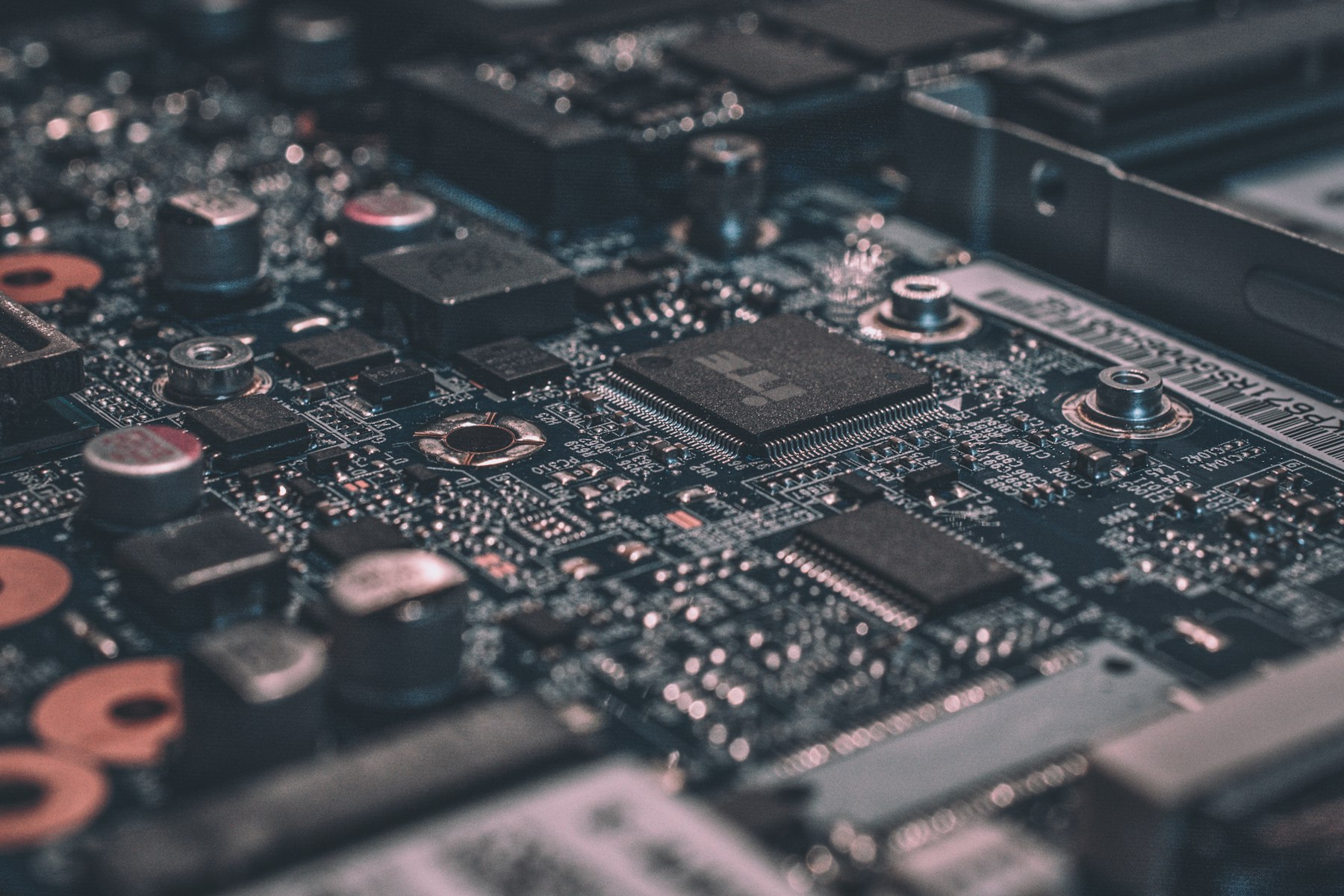 Close up of a circuit board with glowing traces