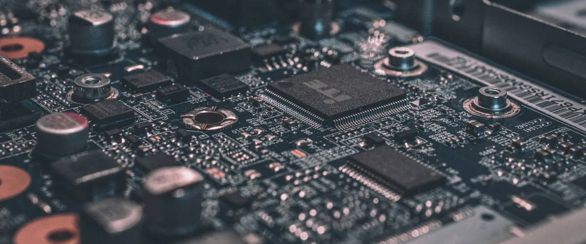 Close up of a circuit board with glowing traces