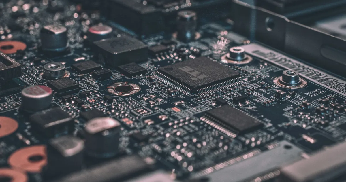 Close up of a circuit board with glowing traces