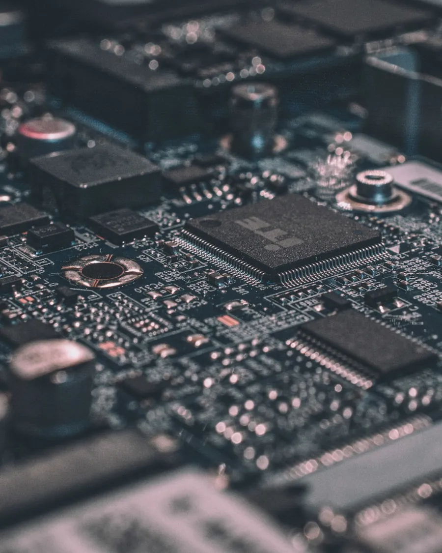 Close up of a circuit board with glowing traces