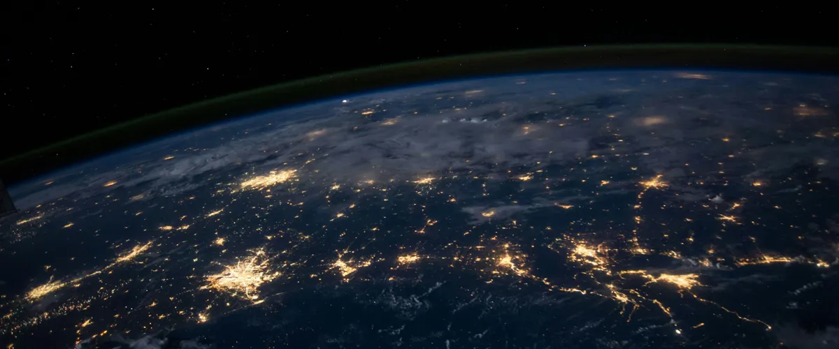 Glowing network lines over the Earth at night